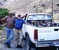 Larry and Vern donate firewood