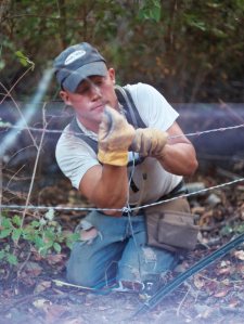 Jeremiah Evans during fence construction.